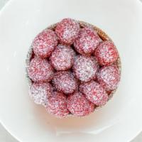 Raspberry Tartelette (New!) · Shortcrust, almond biscuit, raspberry coulis, fresh raspberries.