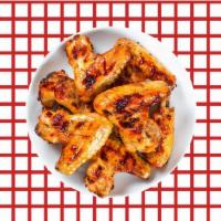 Classic Wings · Bone-in traditional chicken wings in a choice of buffalo, sweet chili garlic, or our signatu...