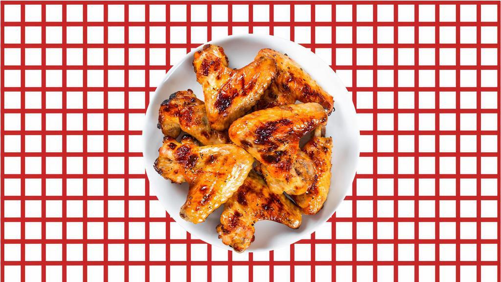 Classic Wings · Bone-in traditional chicken wings in a choice of buffalo, sweet chili garlic, or our signature BBQ sauce.