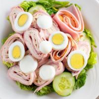Chef'S Salad · It's mixed romaine tomato, onion, olives, peppers, on top ham, provolone, turkey, and slice ...