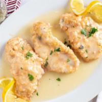 Chicken Francese · Tender breast of chicken with lemon, white wine and butter sauce.