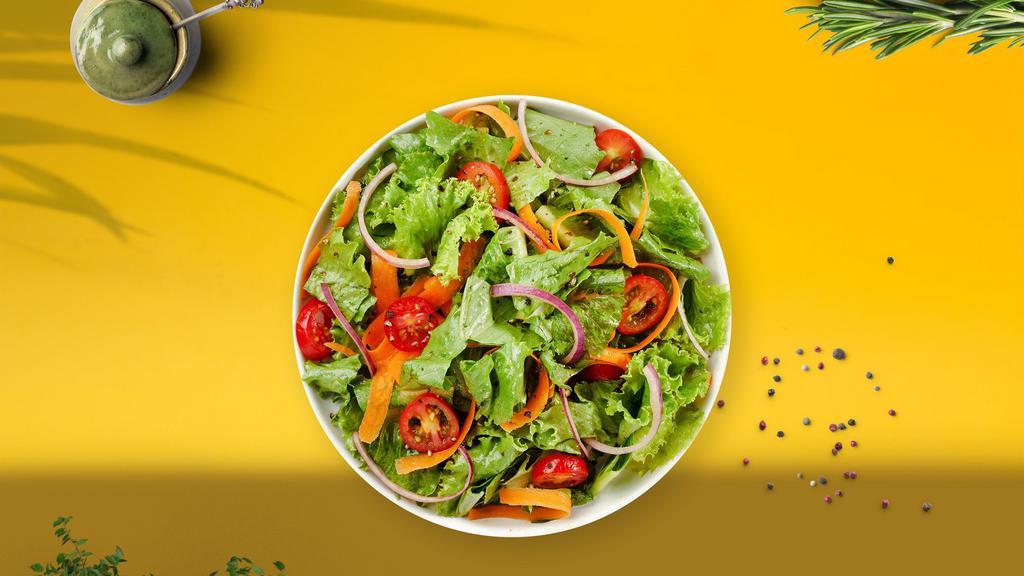 Green Garden Salad · Romaine lettuce, cherry tomatoes, carrots, and onions dressed tossed with lemon juice & olive oil