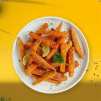 Sweet Spud Fries · Thick-cut sweet potato wedges fried until golden brown