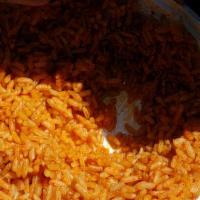 Jollof Rice · Popular Menu Item. Served with mixed meat.