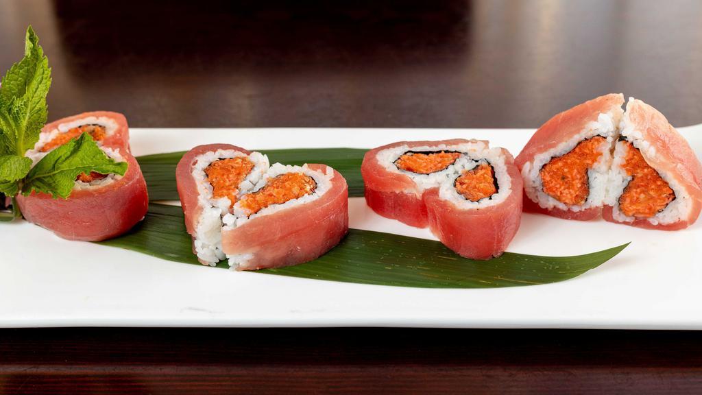 Passion Roll · Spicy crunchy tuna, salmon, yellowtail & crab stick with tuna wrapped around the outside make like a heart.