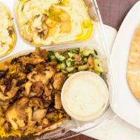 Hummus & Babagnush · Chicken shawarma or lamb gyro. Served with rice, salad, and one pita bread for dipping.