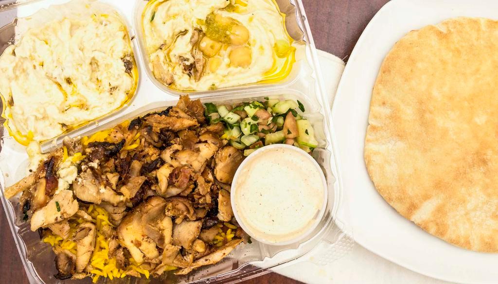 Hummus & Babagnush · Chicken shawarma or lamb gyro. Served with rice, salad, and one pita bread for dipping.