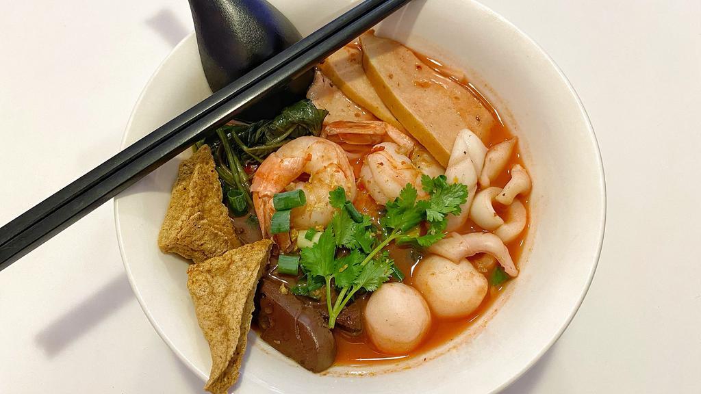 Yen Ta Fo Noodle Soup · Your choice of noodle with shrimp, calamari, fish balls, sliced fish cake, fried tofu, pork blood and morning glory (seasonal) in red bean curd broth