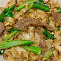 Pad See Ew · Stir fried flat rice noodle with your choice of meat, egg and chinese broccoli in sweet blac...