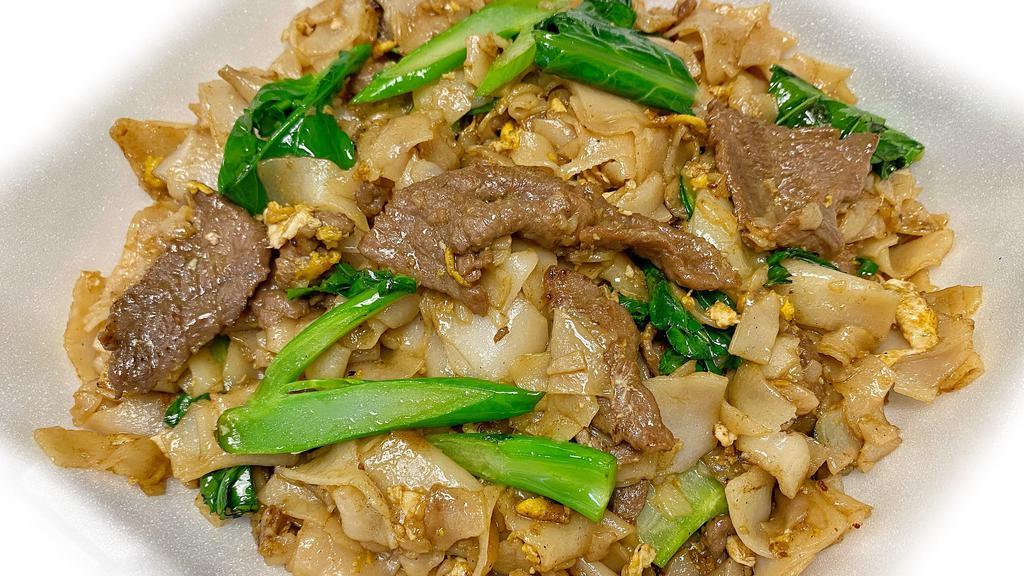 Pad See Ew · Stir fried flat rice noodle with your choice of meat, egg and chinese broccoli in sweet black soy sauce.