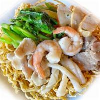 Rad Nar · Thai style gravy sauce with shrimps, calamari, fish cake, chicken, beef and Chinese broccoli...