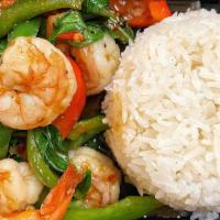 Pad Ga Prow · Spicy. Sautéed with your choice of ground meat, bell pepper, Thai chili and basil. Served ov...