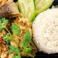 Pad Gra Tiam · Sautéed with your choice of meat and mushroom in garlic sauce. Topped with cilantro and cucu...