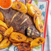 Grilled Fish & Plantain · With sauce.