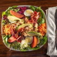 The Kitchen Salad · Mesculin or romaine lettuce with marinated shredded carrots and cabbages , tomato , cucumber...