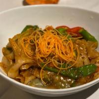 Drunken Noodles · Spicy. Flat noodle with basil, red pepper, egg, carrot, and onion.