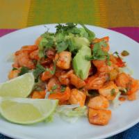 Ceviche · Whitefish, shrimp, scallops, chilies, diced onions, and cilantro marinated in lime juice.