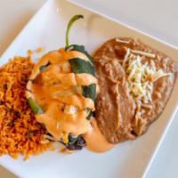  Chile Relleno (Chicken Or Vegetables) · Stuffed poblano pepper with cheese, your choicde of chicken or vegetables, Served with rice ...