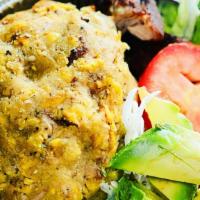 Pork Mofongo · Fried mashed garlic green plantains.
in a ball with pernil or fried pork (chicharron)
gravy ...