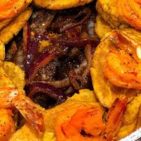 Shrimp In Garlic Sauce · Grilled adobo Shrimp in garlic sauce.
Served with rice and beans, green plantain, sweet plan...