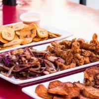 Whole Rotisserie Chicken Family Combo · Large rice, medium beans, green plantains, salad and 1-liter soda.