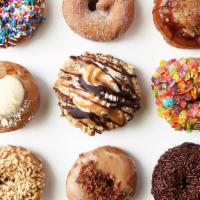 Confused Dozen · One of each of our 12 flavors. Includes four classic donuts and the crazy 8s.