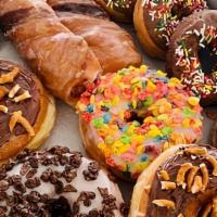 Dozen Of Classic Donuts · Three of each flavor.