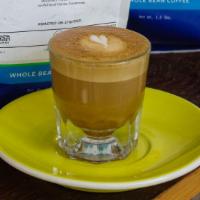 Cortado · 4oz
Double Shot of espresso with Two ounces of steamed milk (textured like a Latte but less ...
