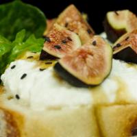 Fig & House Ricotta Toast · House-made ricotta, black mission figs, black sesame seeds, sea salt and lemon on balthazar ...