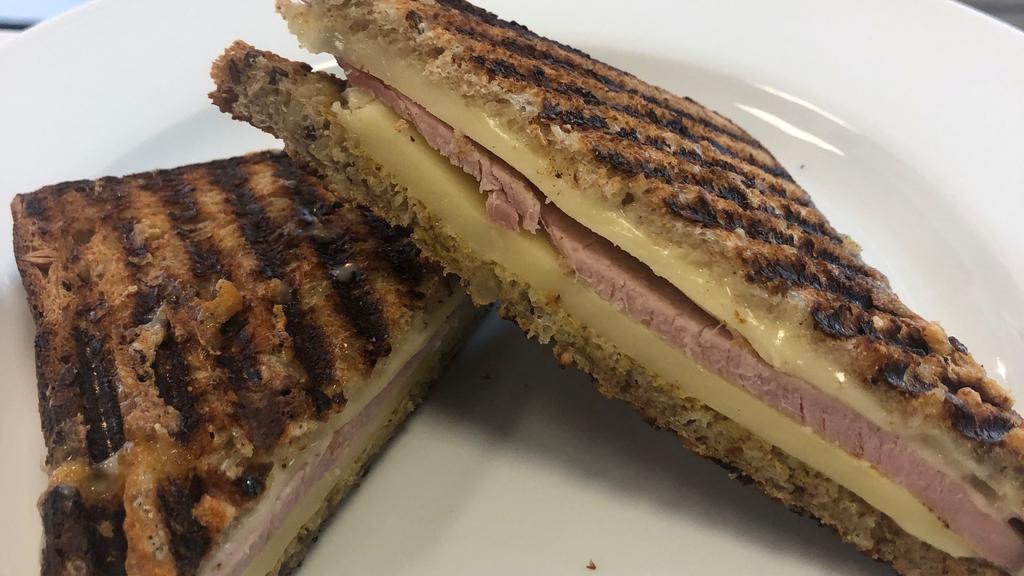 Toasted Woodland Ham & Gruyere Cheese Sandwich · Served on balthazar multigrain with dijon mustard