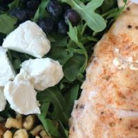 Hearty Chicken Breast Salad · Roasted antibiotic free chicken breast, blueberries, pomegranate, goat cheese, walnuts on a ...