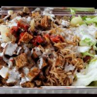 Lamb Over Rice · Best quality fresh lamb gyro with rice and salad.