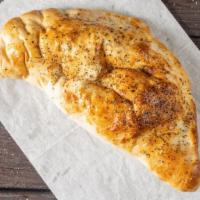 Cheese Calzone · Stuffed folded pizza pocket with cheese.