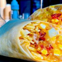 The M.F.B.A. · A breakfast burrito like no other! Two eggs diced with your choice of bacon or sausage, shre...