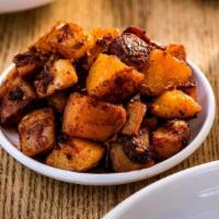 Home Fries · Yukon gold potatoes cooked with the skin in oil, with green and red bell peppers, onion and ...