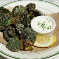 Salt + Pepper Broccoli · Deep fried broccoli in rice flour and salt and pepper with a side of Ranch Dressing  - Glute...