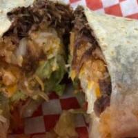 Suadero Burrito · Special beef cut, beans, rice, lettuce, pico de gallo, sour cream, cheese, and guacamole, al...