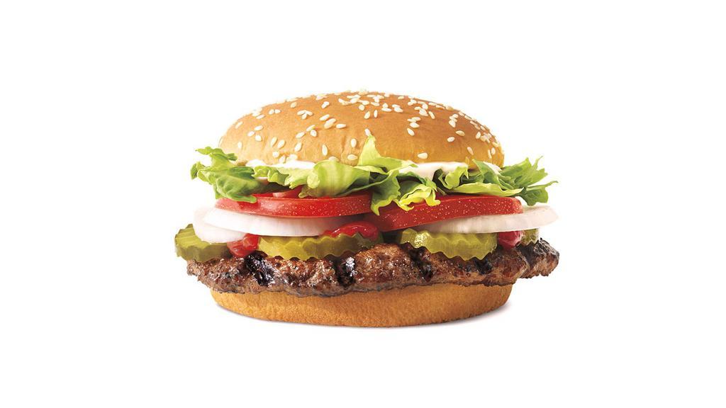 Whopper® · Our WHOPPER® Sandwich is a 1/4 lb* of savory flame-grilled beef topped with juicy tomatoes, fresh lettuce, creamy mayonnaise, ketchup, crunchy pickles, and sliced white onions on a soft sesame seed bun. *Based on pre-cooked patty weight.