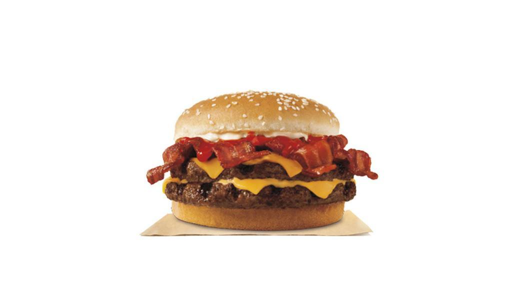 Double Bacon King™ Sandwich · Our Bacon King Sandwich features two 1/4 lb* savory flame-grilled beef patties, topped a with hearty portion of thick-cut smoked bacon, melted American cheese and topped with ketchup and creamy mayonnaise all on a soft sesame seed bun.*Based on pre-cooked patty weight.