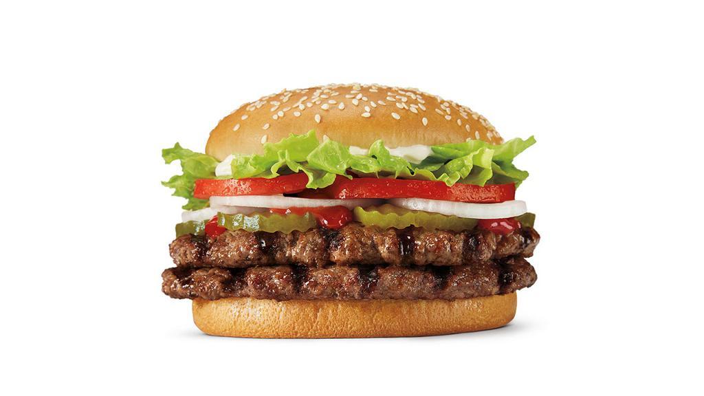 Double Whopper® · Our Double WHOPPER® Sandwich is a pairing of two 1/4 lb* savory flame-grilled beef patties topped with tomatoes, fresh lettuce, mayonnaise, ketchup, pickles, and sliced white onions on a soft sesame seed bun. *Based on pre-cooked patty weight.