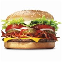 Whopper® With Bacon & Cheese · A ¼lb of savory flame-grilled beef topped with thick-cut smoked bacon, melted American chees...
