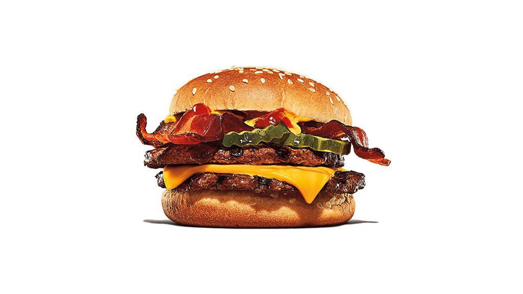 Bacon Double Cheeseburger · Make room for our Bacon Double Cheeseburger, two signature flame-grilled beef patties topped with smoked bacon and a simple layer of melted American cheese, crinkle cut pickles, yellow mustard, and ketchup on a toasted sesame seed bun.