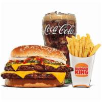 Double Quarter Pound King™ Meal · Featuring more than ½ lb.* of flame-grilled 100% beef, topped with all of our classic favori...