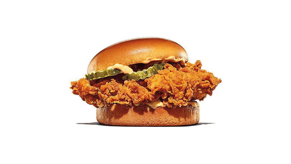 Ch'King · Our Hand-Breaded Crispy Chicken Sandwich is made with a seasoned 100% white meat chicken breast, hand-battered and breaded in a light and crispy coating, topped with a creamy savory sauce and crunchy pickles on a toasted bun.