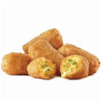 8Pc Jalapeno Cheddar Bites · Our Jalapeño Cheddar Bites are filled with gooey cheddar cheese and spicy jalapeño pieces, c...