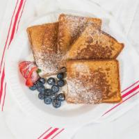 Old Fashion French Toast · Four slices of thin bread French toast with maple syrup.