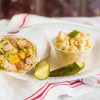 Caesar Wrap · Marinated grilled chicken, crisp romaine lettuce, croutons, and Caesar salad dressing.