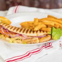 #1. Grilled Chicken Panini · Grilled chicken, Mozzarella cheese, roasted red peppers, lettuce, tomatoes.