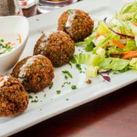 Falafel · Gluten-free. Vegetarian. Grounded chickpea patties blended with fresh vegetables and spices.