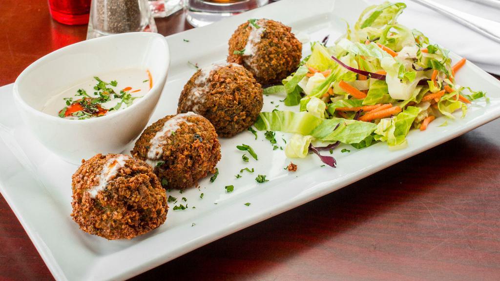 Falafel · Gluten-free. Vegetarian. Grounded chickpea patties blended with fresh vegetables and spices.